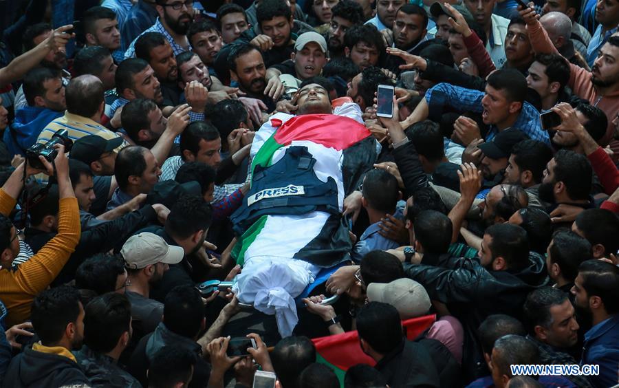 MIDEAST-GAZA-FUNERAL-JOURNALIST