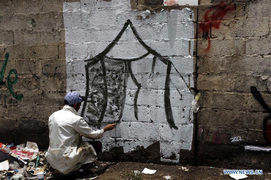 YEMEN-SANAA-GRAFFITI 