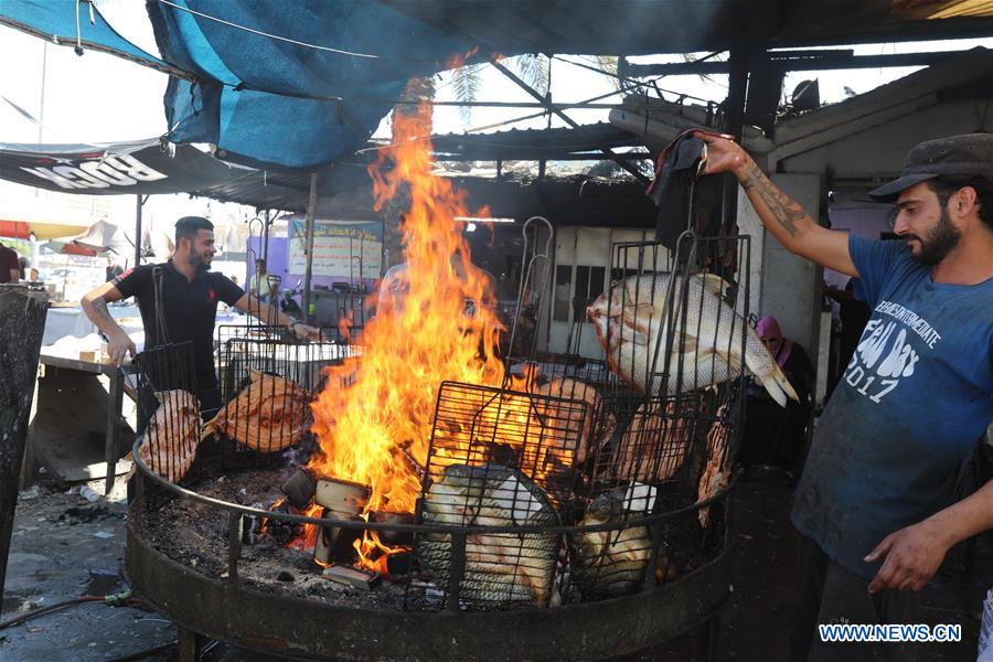 IRAQ-BAGHDAD-MASGOUF-GRILLED FISH