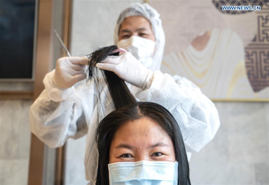 CHINA-HUBEI-WUHAN-LONGTAITOU DAY-MEDICAL STAFF-HAIRCUT (CN)