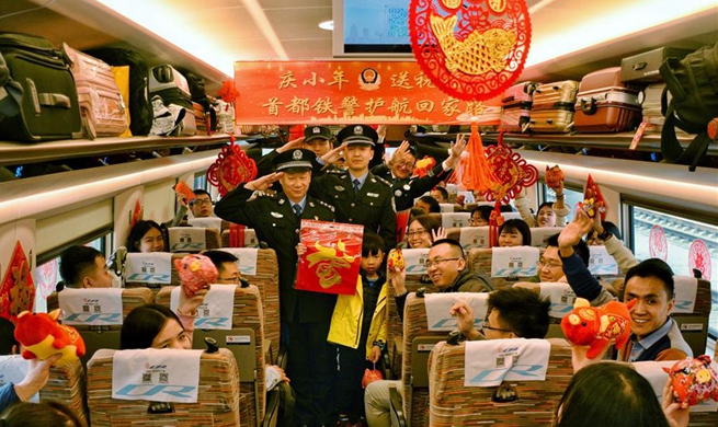 In pics: celebrate Xiaonian Festival at bullet train