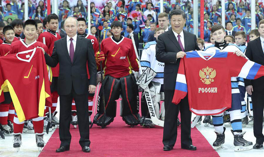 Xi, Putin watch ice hockey match